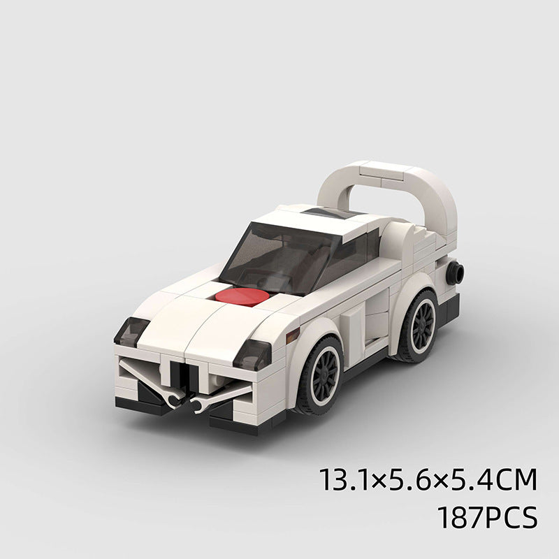 Model Sports Car And Small Particle Building Blocks