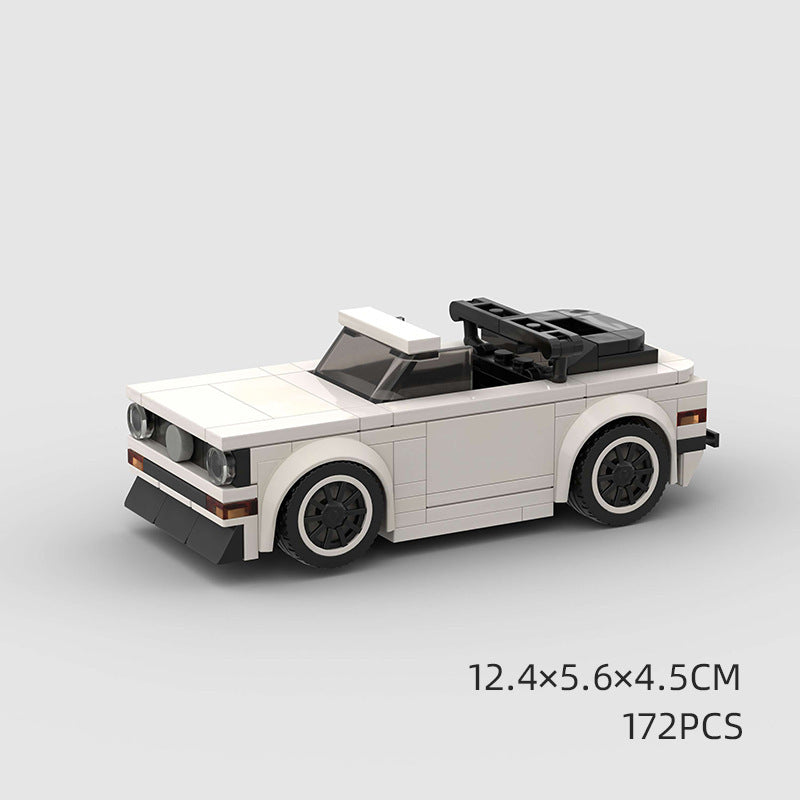 Model Sports Car And Small Particle Building Blocks