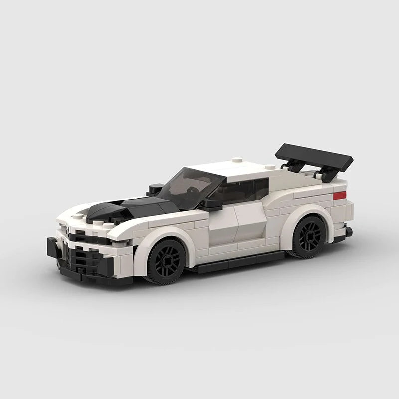 Model Sports Car And Small Particle Building Blocks