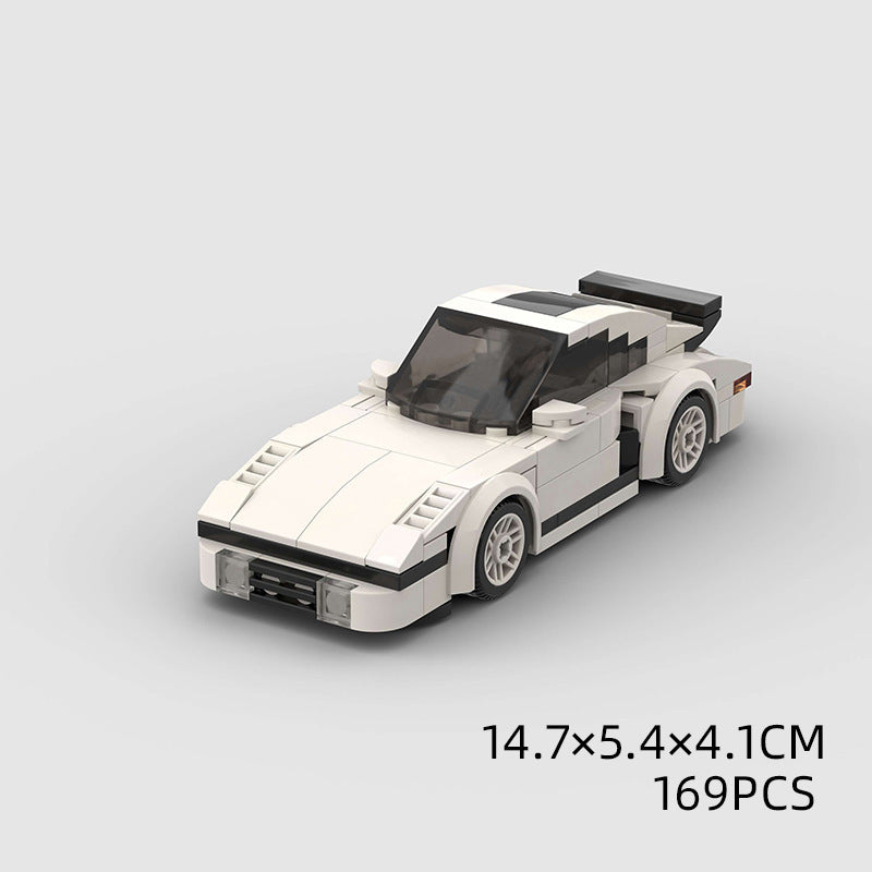 Model Sports Car And Small Particle Building Blocks