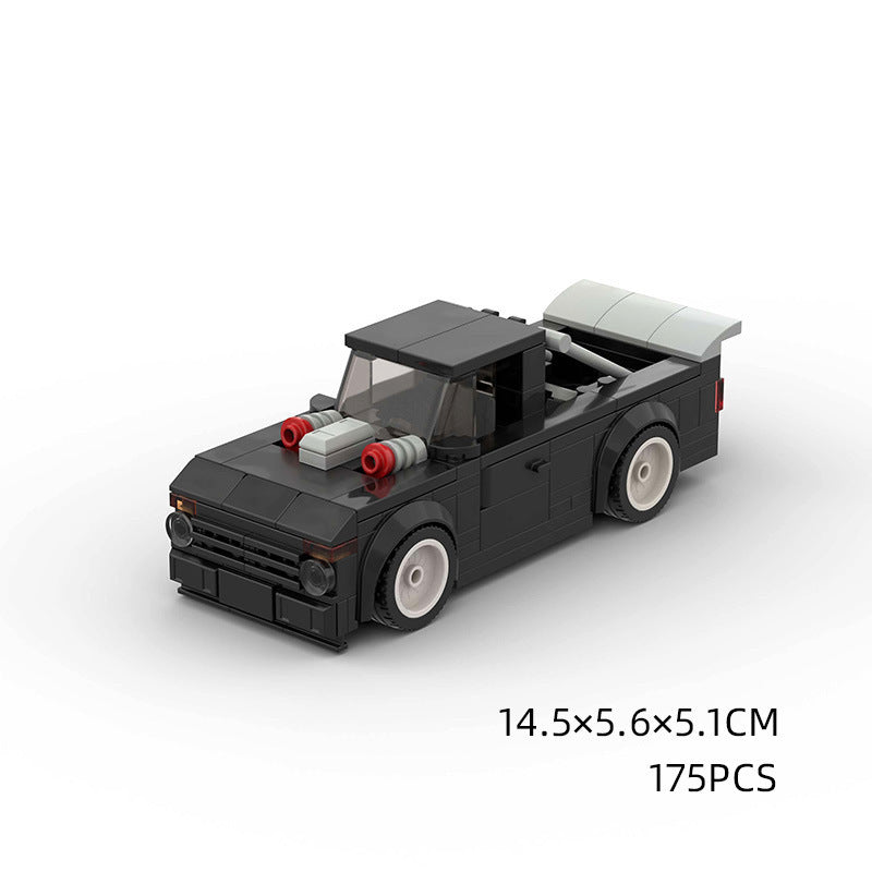 Model Sports Car And Small Particle Building Blocks