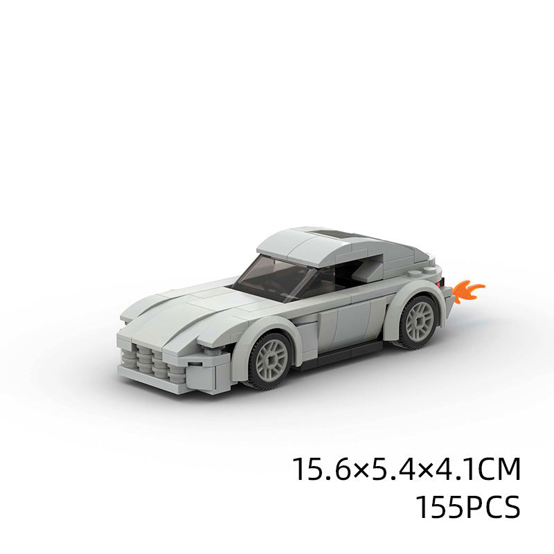 Model Sports Car And Small Particle Building Blocks