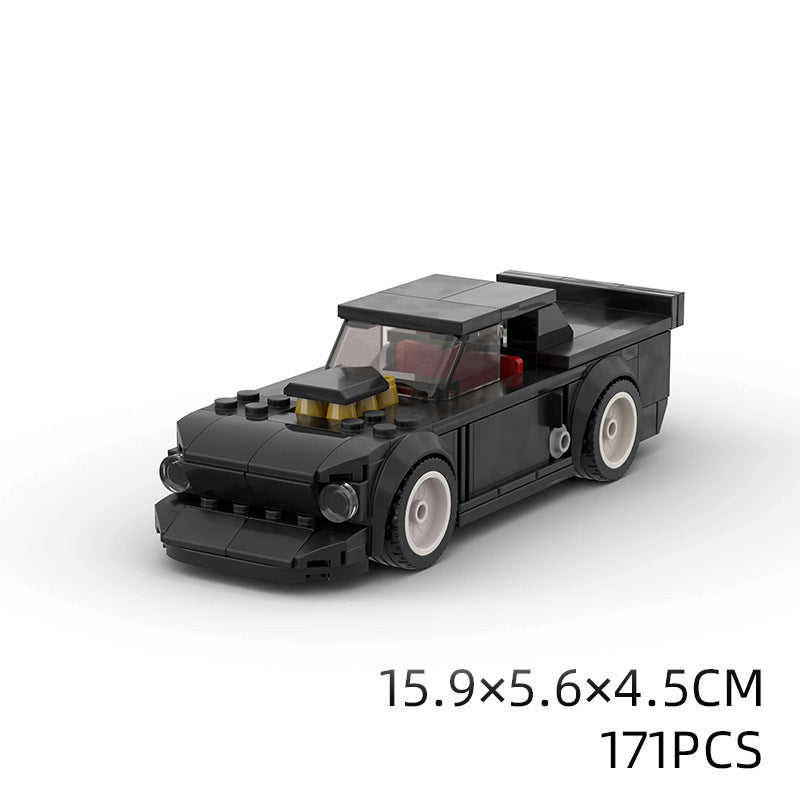 Model Sports Car And Small Particle Building Blocks