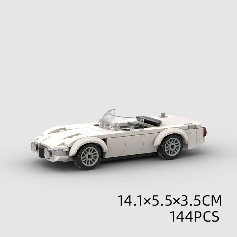 Model Sports Car And Small Particle Building Blocks