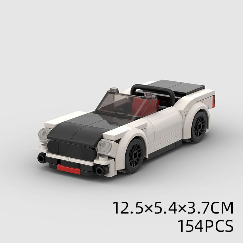 Model Sports Car And Small Particle Building Blocks